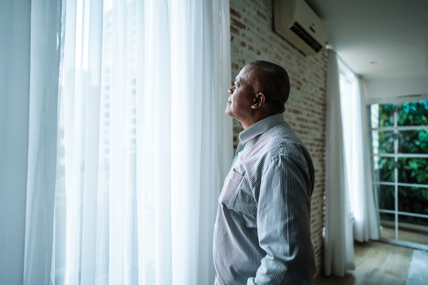 A man looking out of the window.
